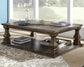 Ashley Express - Johnelle Rectangular Cocktail Table